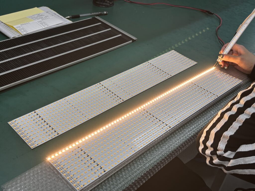 Staff Members Inspect The PCBs After Surface Mounting